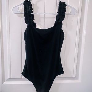 Black ruffles body suit